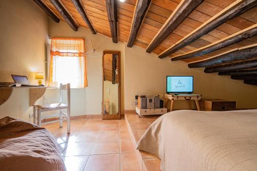 A bed or beds in a room at Agliata 138