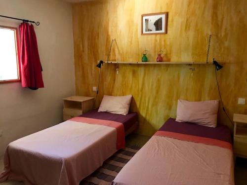 Postel nebo postele na pokoji v ubytování Villa de plein pied en campagne bonifacienne 84m2.