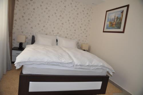 Кровать или кровати в номере Widder Rooms