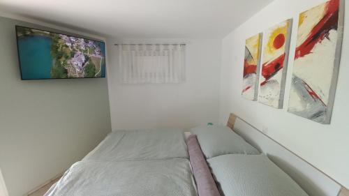 A bed or beds in a room at Apartment SeeYou