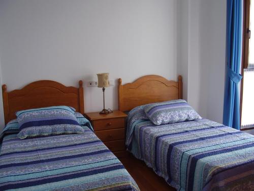 Una cama o camas en una habitación de La Pergola