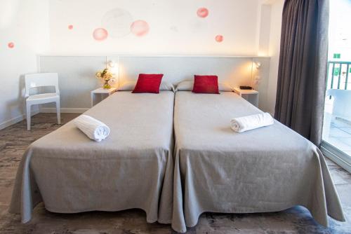 Postel nebo postele na pokoji v ubytování Hotel Tarba