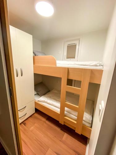 a small room with bunk beds in it at SH Porto 2 Floating House, Marina Portorož in Portorož