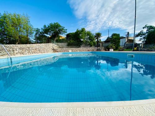 Bazén v ubytování Mastro Vanni - Urban Masseria nebo v jeho okolí