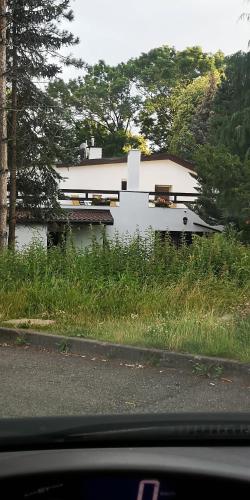 a house sitting on the side of a road at NOCLEGI u ALI in Wałbrzych