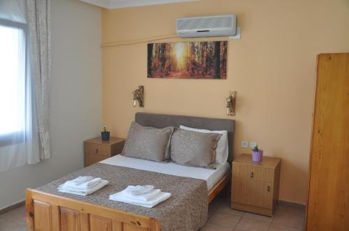 מיטה או מיטות בחדר ב-Dalyando Apart