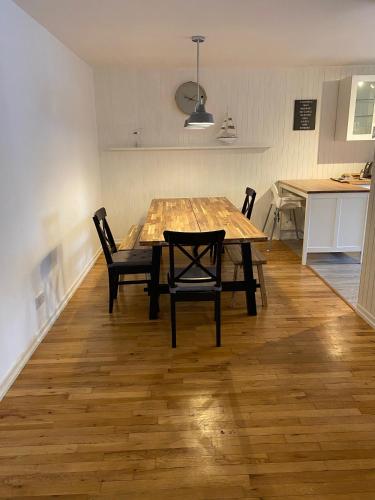 a dining room table and chairs in a kitchen at The Crail Maltings in Crail