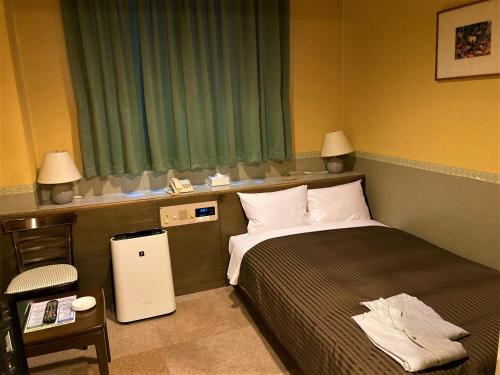 Кровать или кровати в номере Hotel Hamilton Sapporo - Vacation STAY 18902v
