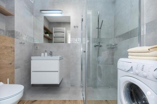Kúpeľňa v ubytovaní Jantar Apartamenty Bliżej Morza