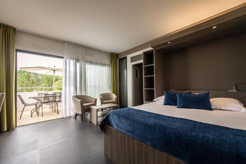 Ένα ή περισσότερα κρεβάτια σε δωμάτιο στο Suite Home Porticcio