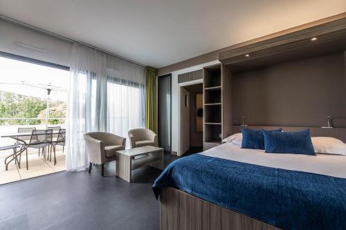 Ένα ή περισσότερα κρεβάτια σε δωμάτιο στο Suite Home Porticcio