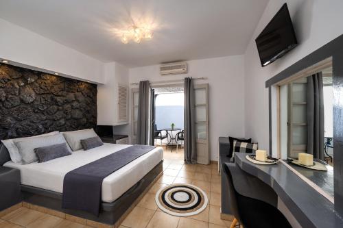 Postel nebo postele na pokoji v ubytování Plastiras Rooms