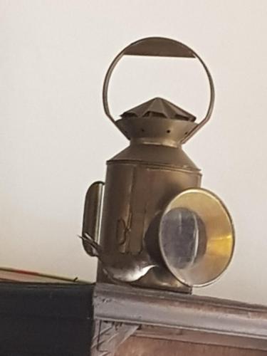 a metal tea kettle on top of a table at antonella home in Brindisi