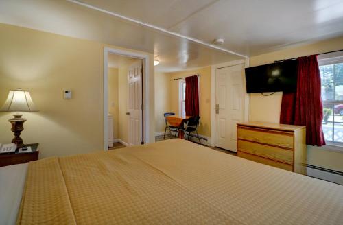 Brookside Inn & Cottagesにあるベッド