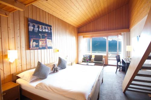 Krevet ili kreveti u jedinici u okviru objekta Hotel Gloria