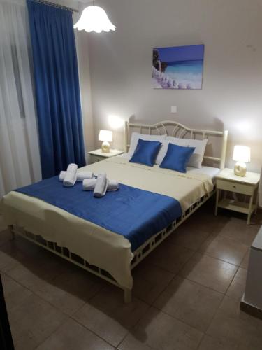 Postel nebo postele na pokoji v ubytování Antigone View Apartments