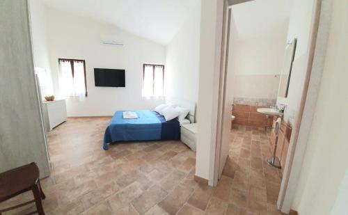 Televízia a/alebo spoločenská miestnosť v ubytovaní Villa Caterina Posada