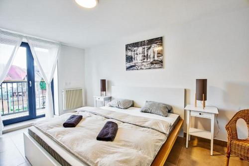 Кровать или кровати в номере Dolcevita apartments 2