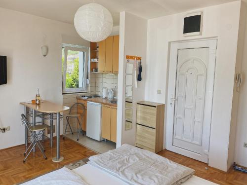 Kuchyň nebo kuchyňský kout v ubytování Apartments Bellevue - Otasevic