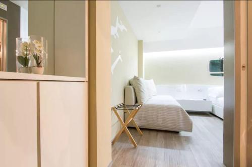 Ginevra Roomsにあるベッド