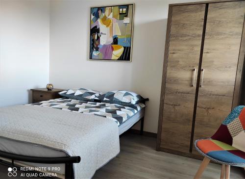 Posteľ alebo postele v izbe v ubytovaní VIEW 20 APARTAMENT