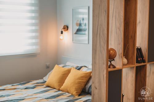 Letto o letti in una camera di Sunrise Luxury Apartment