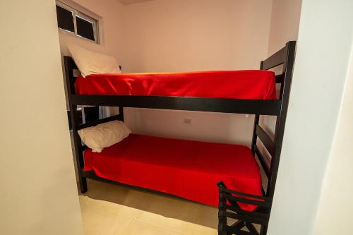 Ένα ή περισσότερα κρεβάτια σε δωμάτιο στο Apart Hotel Ayres De Termas