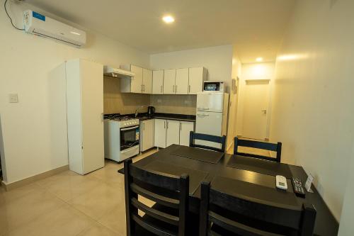 Η κουζίνα ή μικρή κουζίνα στο Apart Hotel Ayres De Termas
