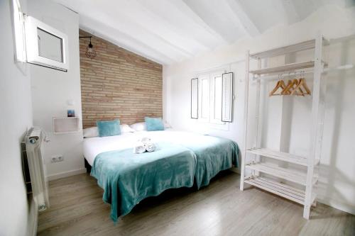 En eller flere senge i et værelse på La casita del Laurel, casa entera, wifi