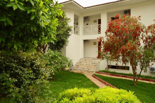 a view of the front yard of a house at White Hotel in Oludeniz