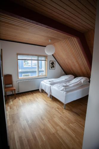 Postel nebo postele na pokoji v ubytování Tórshavn Apartment - In The Center