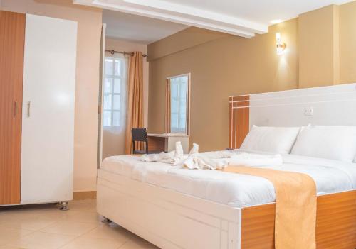 Voodi või voodid majutusasutuse Montana Guest Resort Naivasha toas