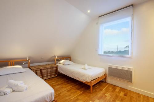 Säng eller sängar i ett rum på Maison du Domaine de la Pointe