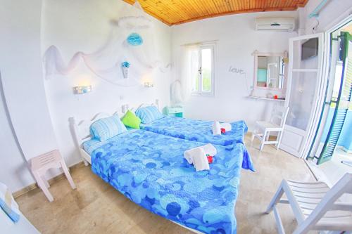 Postel nebo postele na pokoji v ubytování Ninfa Garden Corfù