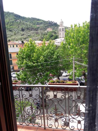 a balcony with a view of a city at affittacamere la loggia in Levanto