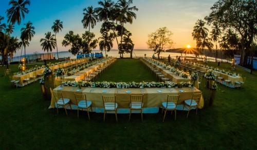 an overhead view of a wedding reception with tables and chairs at Grand Hyatt Goa in Panaji
