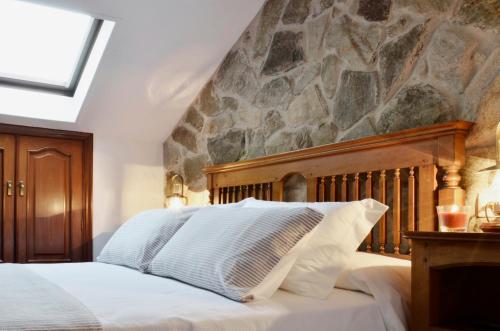 A bed or beds in a room at Sete Artes by Como en Casa