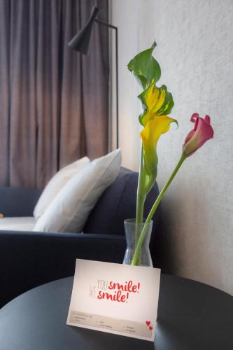 Ένα ή περισσότερα κρεβάτια σε δωμάτιο στο ibis Styles Den Haag Scheveningen