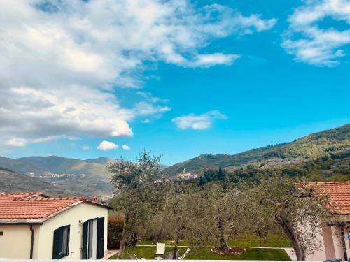 a view of the mountains from a house at Casa vacanze gli ulivi in Borgomaro