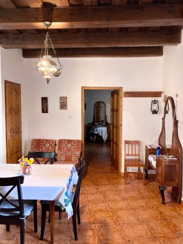 a living room with a table and a couch at Ubytovanie u Aranky in Čierna nad Tisou