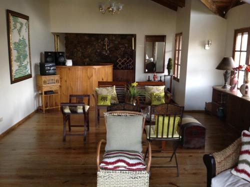a living room with a table and chairs at Villa Paloma/ Home/ Office-Remote Office in Constanza