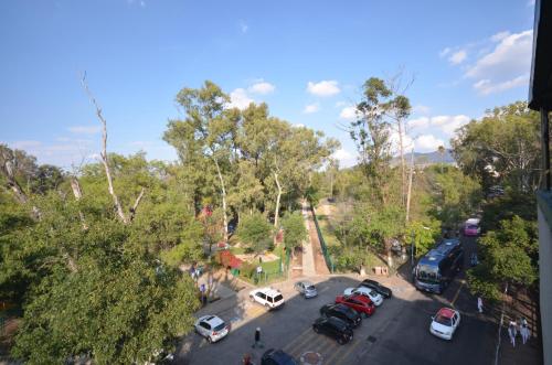 a view of a parking lot with cars parked at Hotel Diana del Bosque by DOT Urban in Morelia