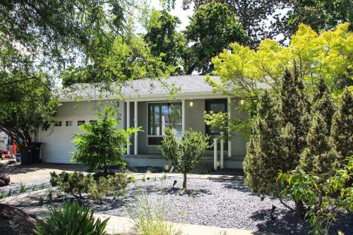 a house with trees in front of it at @ Marbella Lane - SJ Designer Home 3BR Ldry+P in San Jose