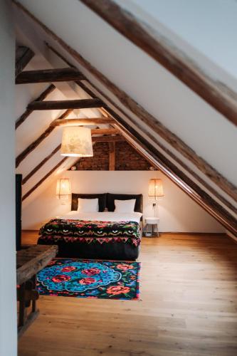 a bedroom with a bed in a attic at 331 in Porumbacu de Sus