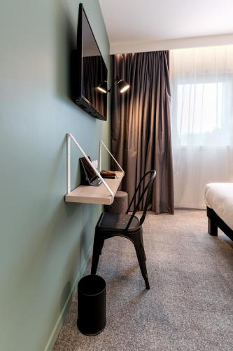 Televisyen dan/atau pusat hiburan di ibis Styles Limoges Centre