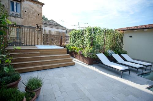 Балкон или терраса в Dimora de Matera Luxury Suites