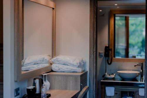 A bathroom at STORK Design Suites