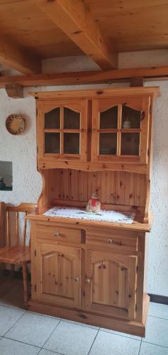 a kitchen with a wooden counter top in a room at Baita di montagna Stavel in Vermiglio