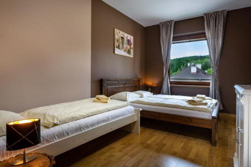 Posteľ alebo postele v izbe v ubytovaní Apartments Sofia