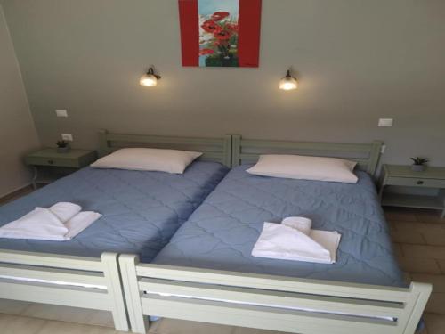 Tempat tidur dalam kamar di Rio Grande Rooms
